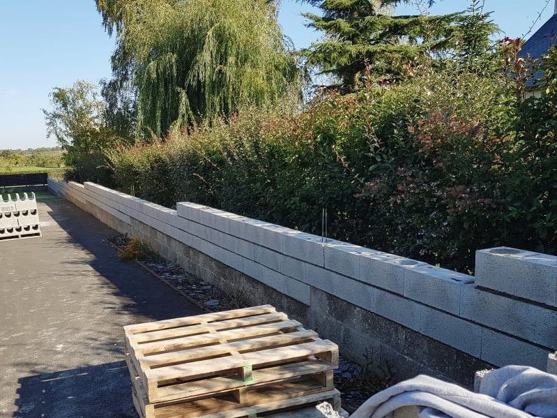 Réhaussement mur parpaings